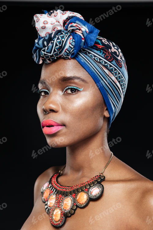 Preview: Close-up portrait of a beautiful african woman wearing shawl