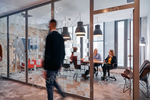 Preview: In the dynamic hustle and bustle of a business environment, a group of young business professionals