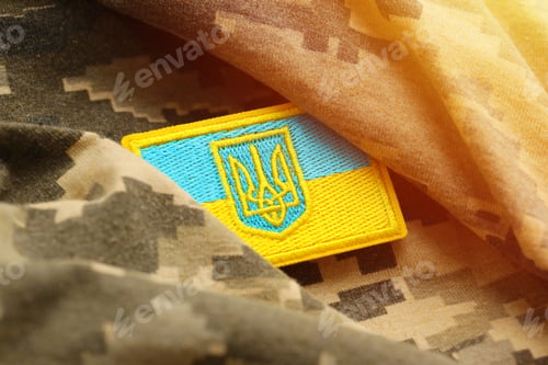 Preview: Military camouflage fabric with ukrainian flag on uniform chevron