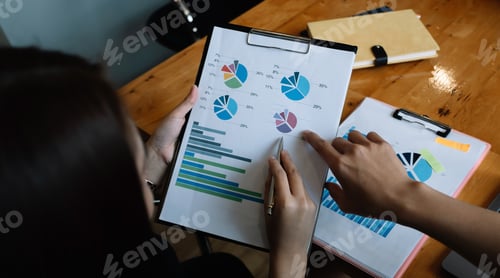Preview: Close up Business People Meeting to analyse and discuss and brainstorming the financial report chart