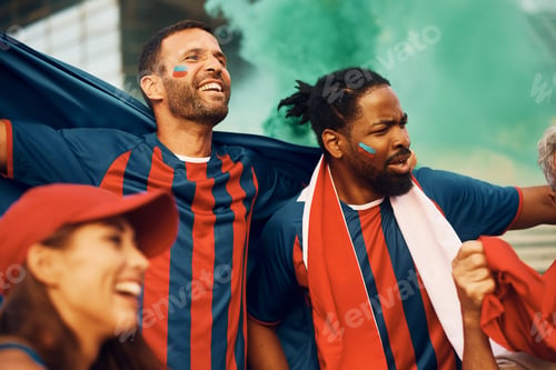 Preview: Excited sports fans cheering during the soccer championship on a stadium.