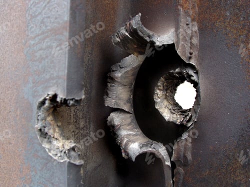 Preview: Ripped straight through - Bullethole