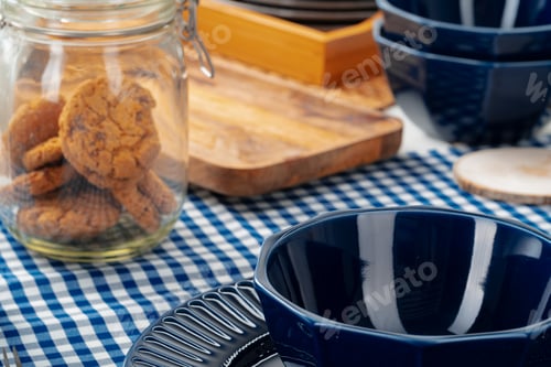 Preview: Classic blue ceramic tableware on checkered tablecloth