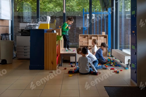 Preview: Children engaged in playful activities in a colorful indoor playroom.