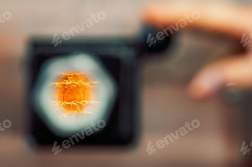 Preview: Closeup shot of burning wood chips in the porthole of the heating boiler
