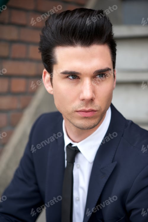 Preview: Good looking male fashion model in suit