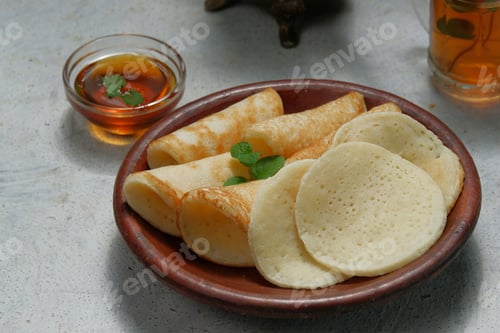 Preview: Moroccan pancakes, Arabic pancakes - Baghrir served with honey and mint tea