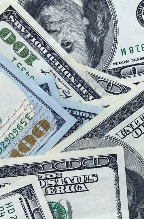 Preview: Abstract backdrop with many hundred dollar bills close up