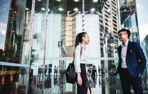 Preview: Asian business people in a city