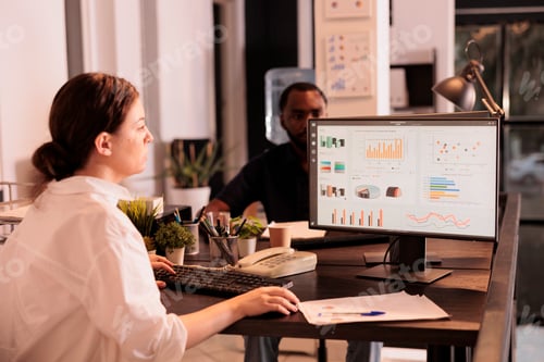 Preview: Analyst looking at marketing report data on computer