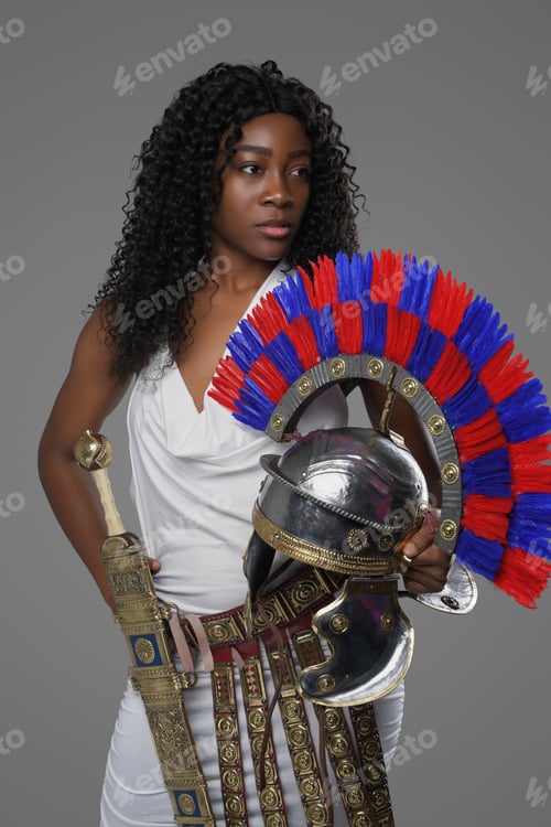 Preview: Military black woman dressed in roman costume isolated on gray