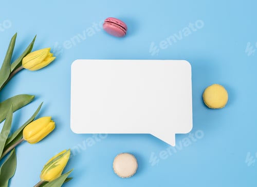 Preview: Macaron,tulips and empty callout on blue.