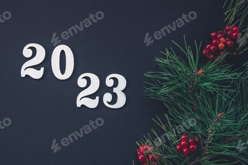 Preview: Christmas background with numbers 2023 and decor details, flat lay.