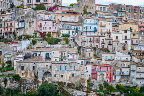Preview: Facade of many houses on a hill