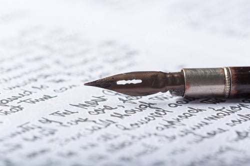 Preview: Writing with a fountain pen on a handwritten letter during a quiet afternoon