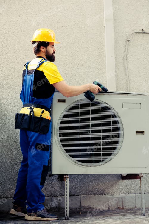 Preview: Technician working on air conditioner