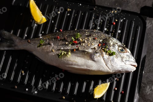 Preview: Raw dorado in a grill