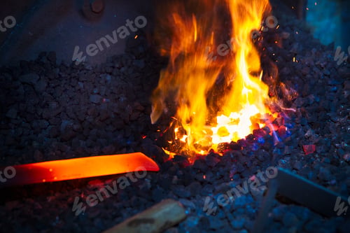 Preview: A length of red hot metal in a furnace.