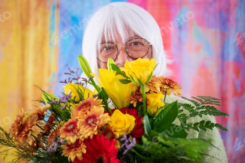 Preview: Blurred white-haired senior woman partially hidden by a bouquet of flowers. Valentine's Day Women's