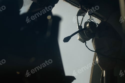 Preview: Closeup selective focus shot of headphones of a helicopter pilot