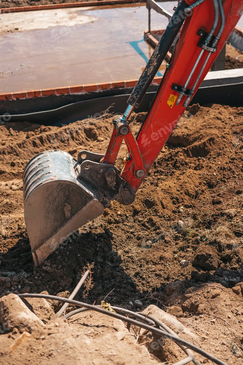 Preview: Excavator shovel digging on dirt