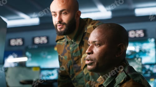 Preview: Army unit working in governmental facility next to colleague