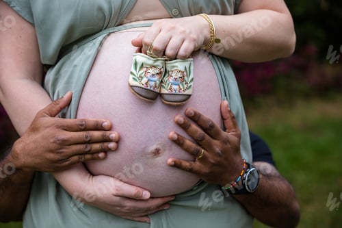 Preview: Baby bump pregnancy maternity hands details outdoors gardens Kenya