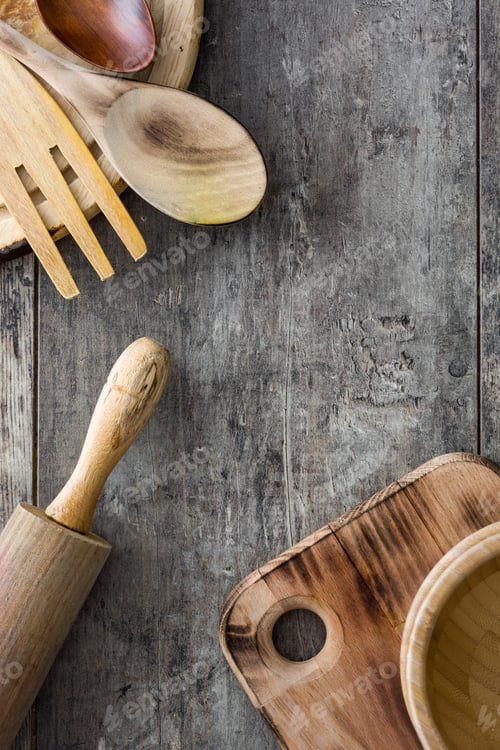 Preview: Wooden kitchenware on old wooden table top view with copy space