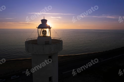 Preview: Aerial view of the lighthouse of Viareggio Tuscany taken at sunset