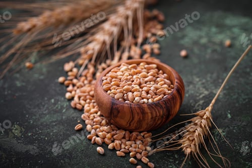 Preview: Wheat grains and spikelets on rusty background.
