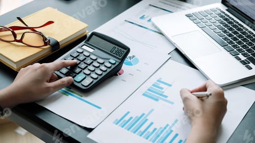 Preview: Top view of Business woman calculator and laptop for calculating finance, tax, accounting
