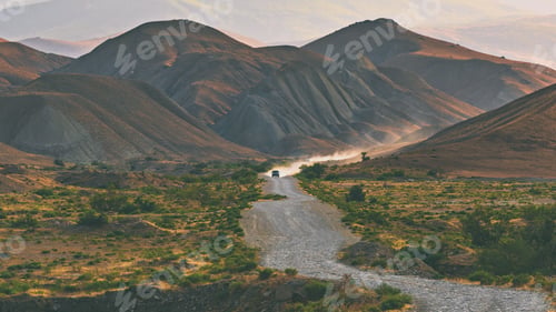 Preview: Dirt road leading to the mountains