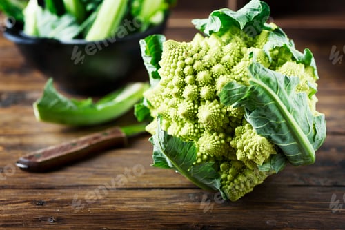 Preview: Raw fresh Roman cauliflower on the wooden table