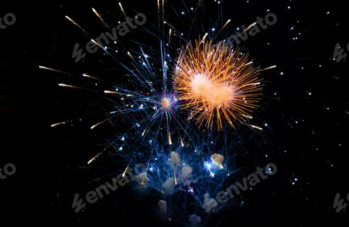 Preview: Colorful fireworks in the sky on black background. celebratory salute, fireworks