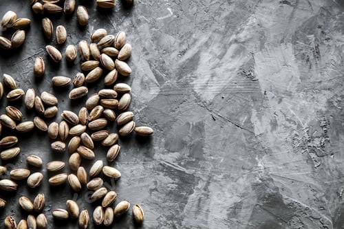 Preview: Big set of salted pistachios on the table. Pistachios nuts