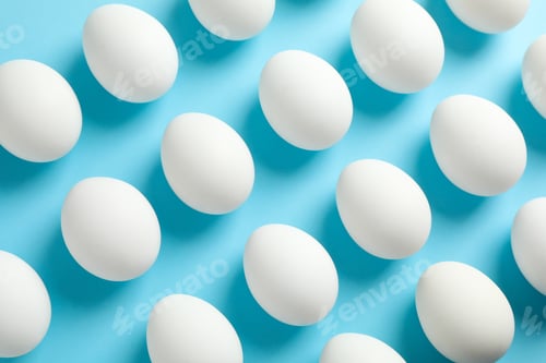 Preview: Flat lay composition with chicken eggs on color background, space for text