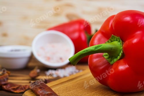 Preview: Pepper, tomato, salt, different spice on wooden background