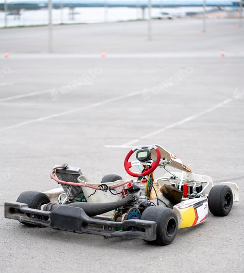 Preview: a karting machine vehicle parked near racetrack, go-kart hobby
