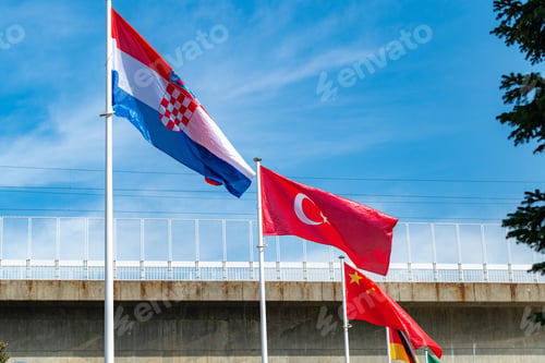 Preview: The national flag of Serbia waving in the blue sky