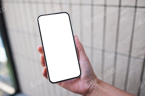 Preview: Mockup image of a woman holding and using mobile phone with blank desktop screen