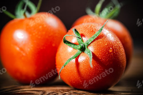 Preview: Fresh tomatoes. On wooden table.