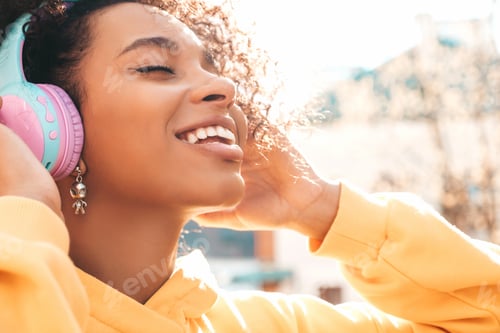 Preview: Young beautiful woman posing outdoors