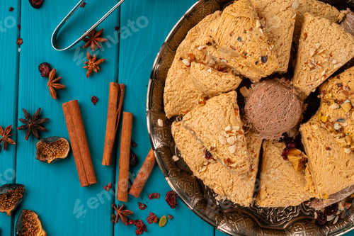 Preview: Turkish halva national dessert on blue wooden table
