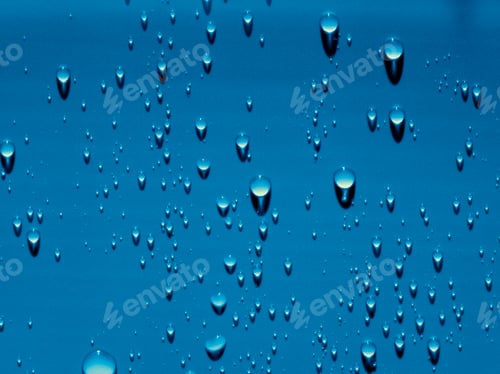 Preview: Shiny water drops and shadows on the blue background