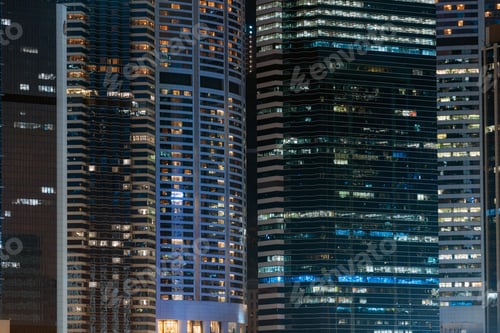 Preview: Closeup Hong Kong Cityscape skyscraper at night time, business financial district