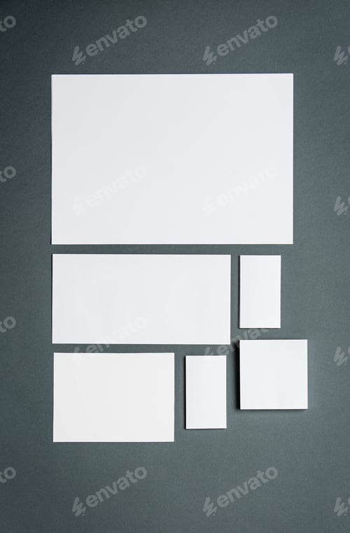 Preview: Mock-up business template with cards, papers. Gray background.