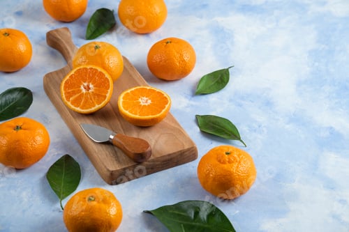 Preview: Pile of mandarins. Whole or half cut
