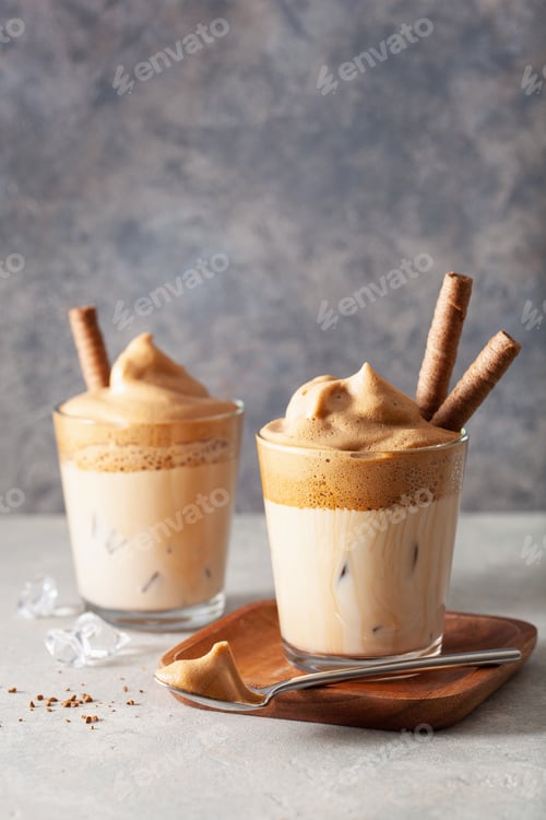 Preview: dalgona coffee in glass. trendy Instant coffee whipped with sugar and hot water