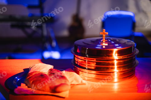 Preview: The process of breaking bread in the modern church.