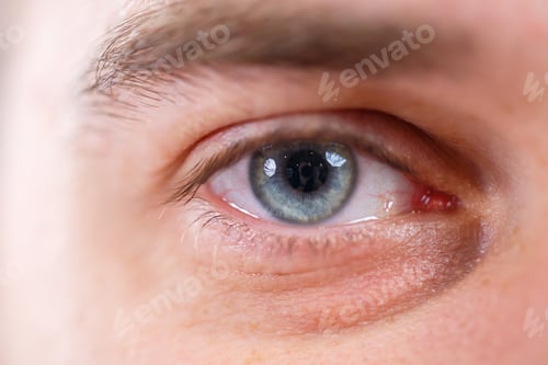Preview: Male blue eye closeup